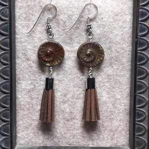 Brown tassels with ceramic shell bead accent
